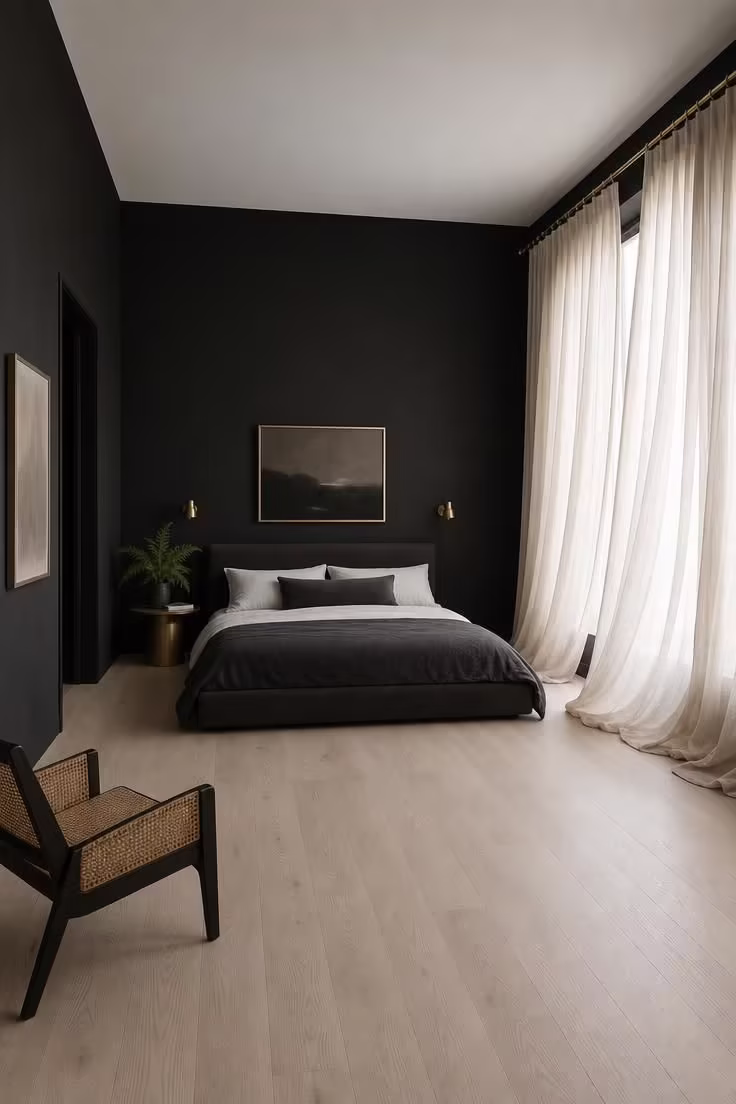 13 Moody Black Nouveau Bedroom Ideas Worth Trying Now 2 Floor-to-ceiling cream linen curtains in a bedroom with matte black paint walls and soft diffused daylight filtering through the fabric.