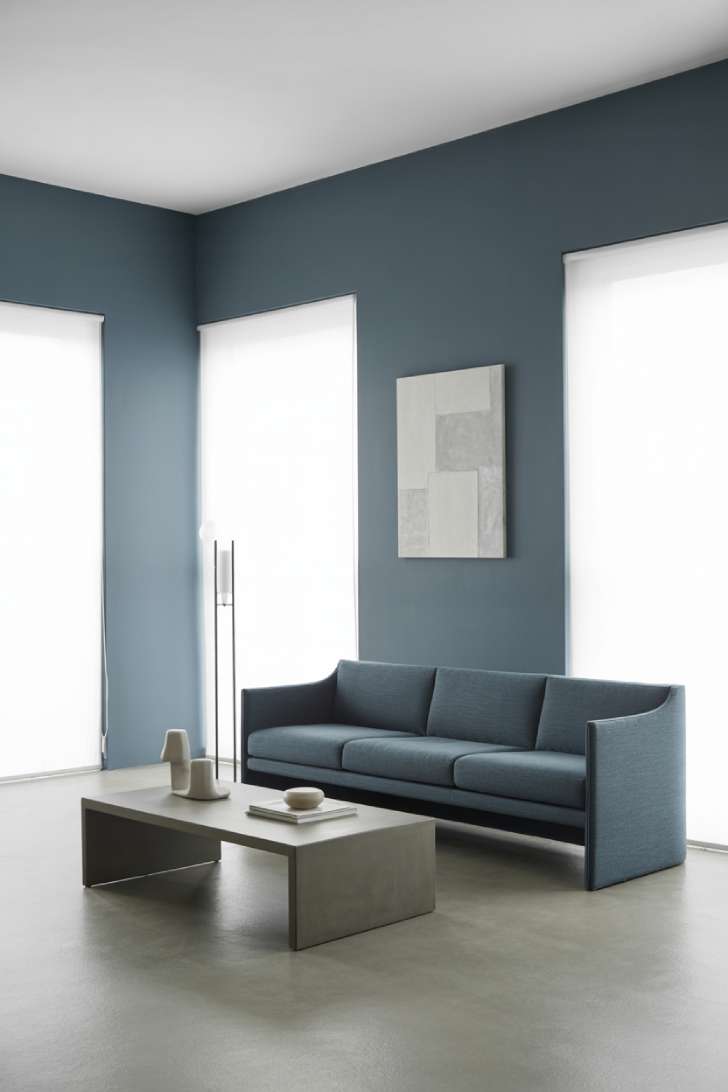 31 Fresh Blue and White Living Room Ideas That Inspire 4 Modern minimalist living room with slate blue sofa and black accents