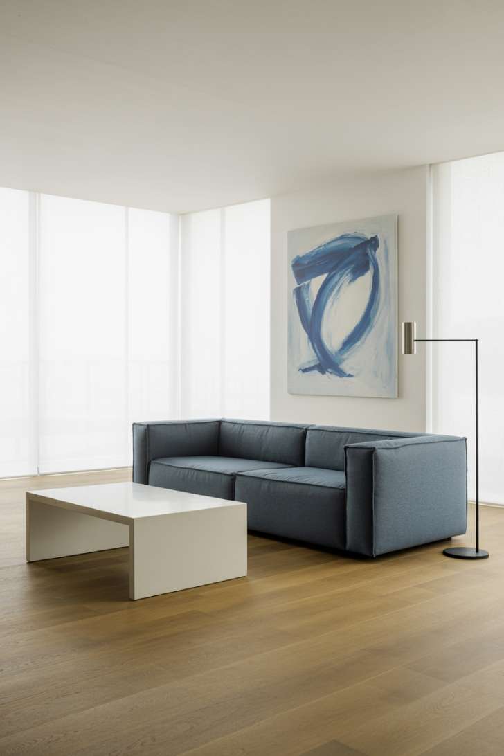 31 Fresh Blue and White Living Room Ideas That Inspire 20 Minimalist living room with gray-blue sofa and minimal decor