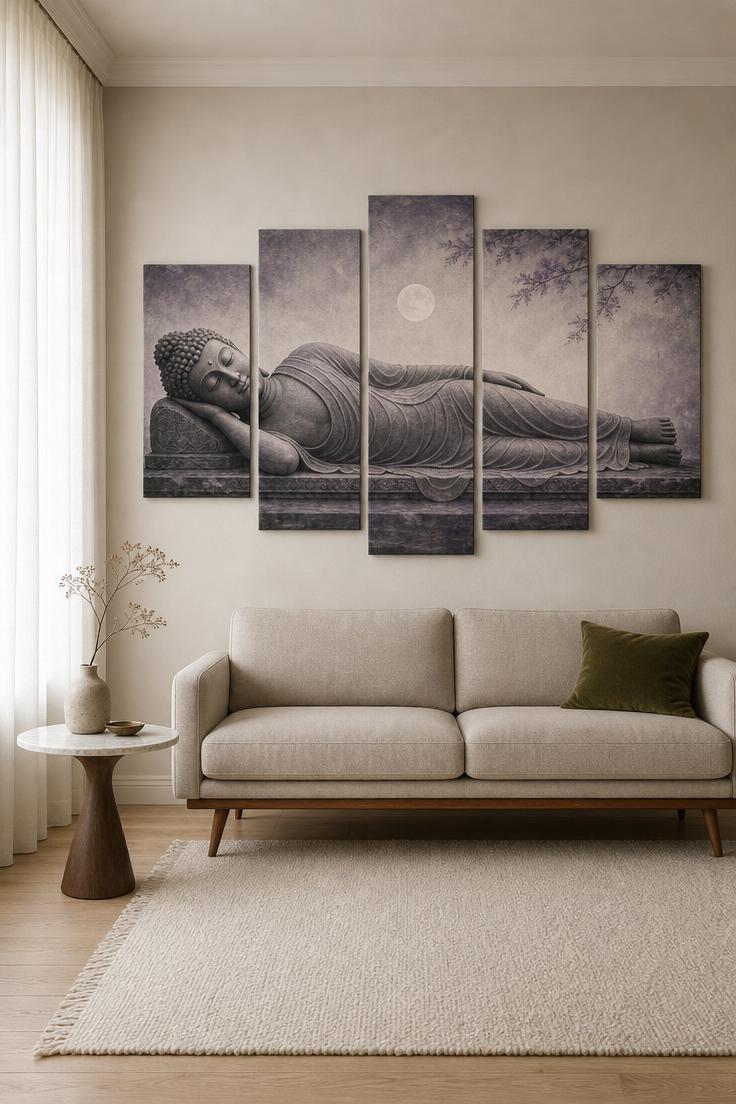 7 Peaceful Buddha Wall Decor Ideas for a Calm Home 3 Five-panel canvas print of a reclining Buddha in muted grey tones hung above a mid-century modern sofa in a room with soft diffused light.