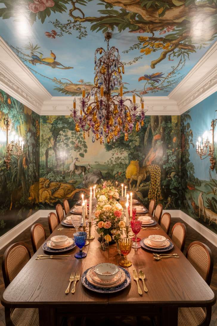13 Playful Colorful Maximalist Decor Ideas That Spark Joy 6 Baroque ceiling fresco dining room with peacock and leopard wallpaper, jewel-tone crystal chandelier, and mismatched dining chairs