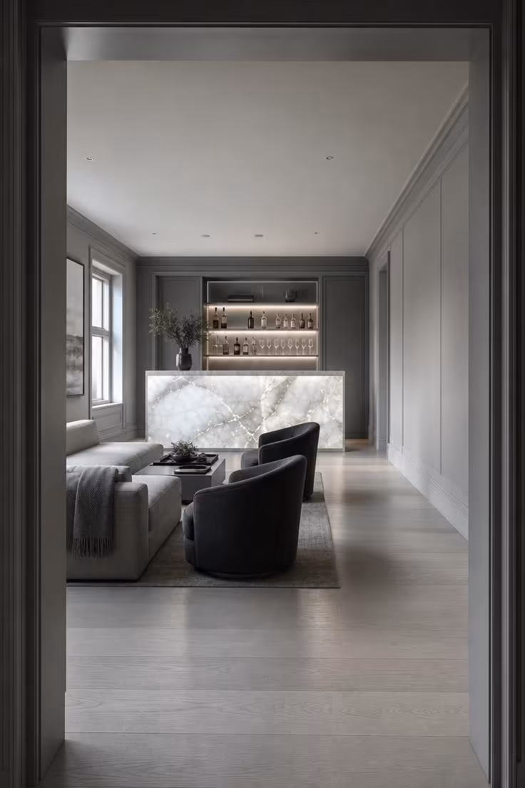 13 Stylish Game Room Ideas for Adults to Lounge and Play 9 Cool-grey lounge with a glowing backlit onyx bar and concealed Murphy game table.