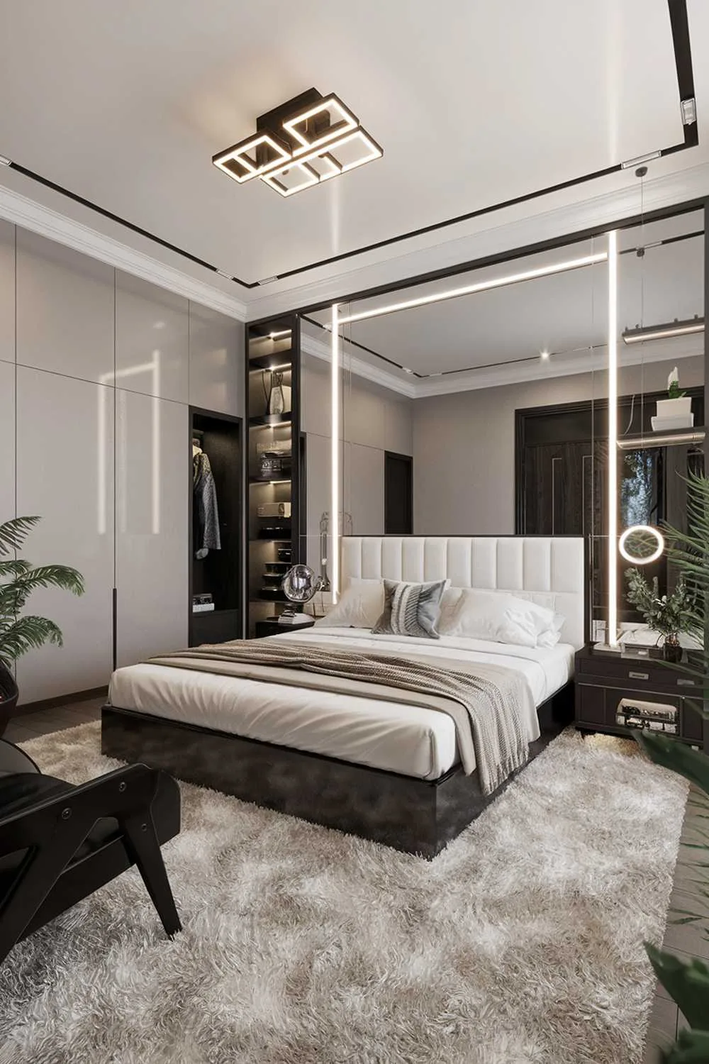 23 Modern Luxury Bedroom Design Ideas You'll Love 6 A modern luxury bedroom design and decor. The room has a king-size bed with a white headboard and a black frame. There's a black chair in the corner. On the right wall, there's a large mirror with built-in LED lights and a few shelves. On the left wall, there's a sleek cabinet. The floor is covered with a white shag rug. The room has a few potted plants. The ceiling has a modern lighting fixture.