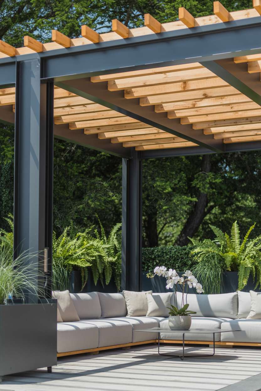 27 Stunning Modern Pergola Design Ideas for Stylish Shade 19 Grey aluminum and cedar pergola with latticework roof over grey sectional with black planters and white orchids