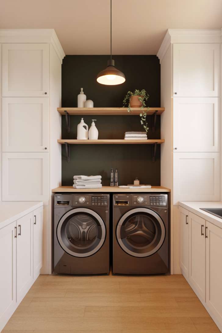 Single dark accent wall laundry room with white cabinets and floating shelves