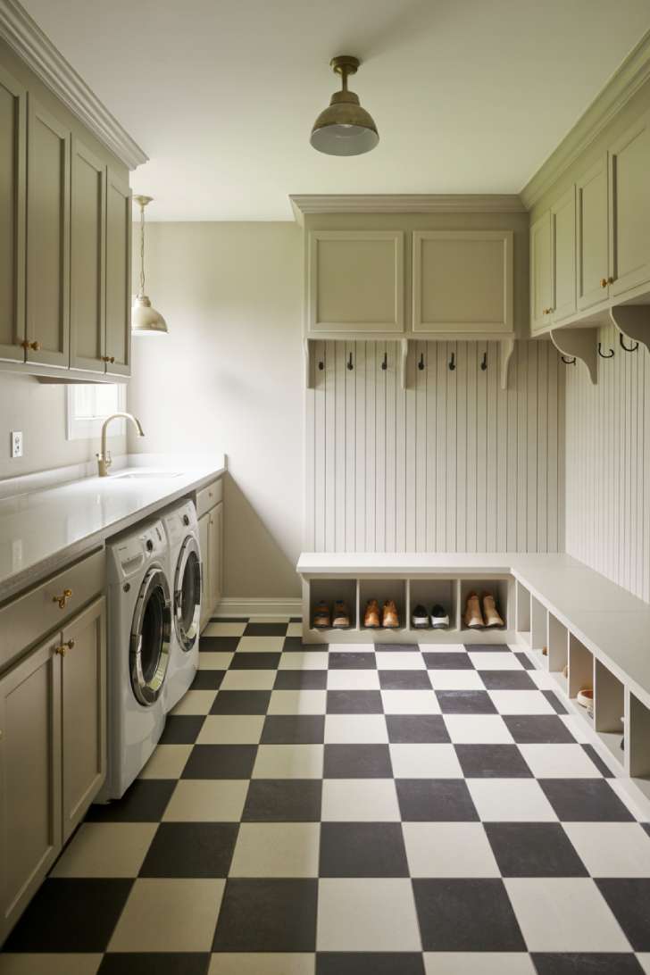 13 Bold Mudroom Laundry Room Ideas for a Stylish Space 8 Mudroom laundry room with black and white checkerboard tile floor, brass hardware, and white shaker cabinetry
