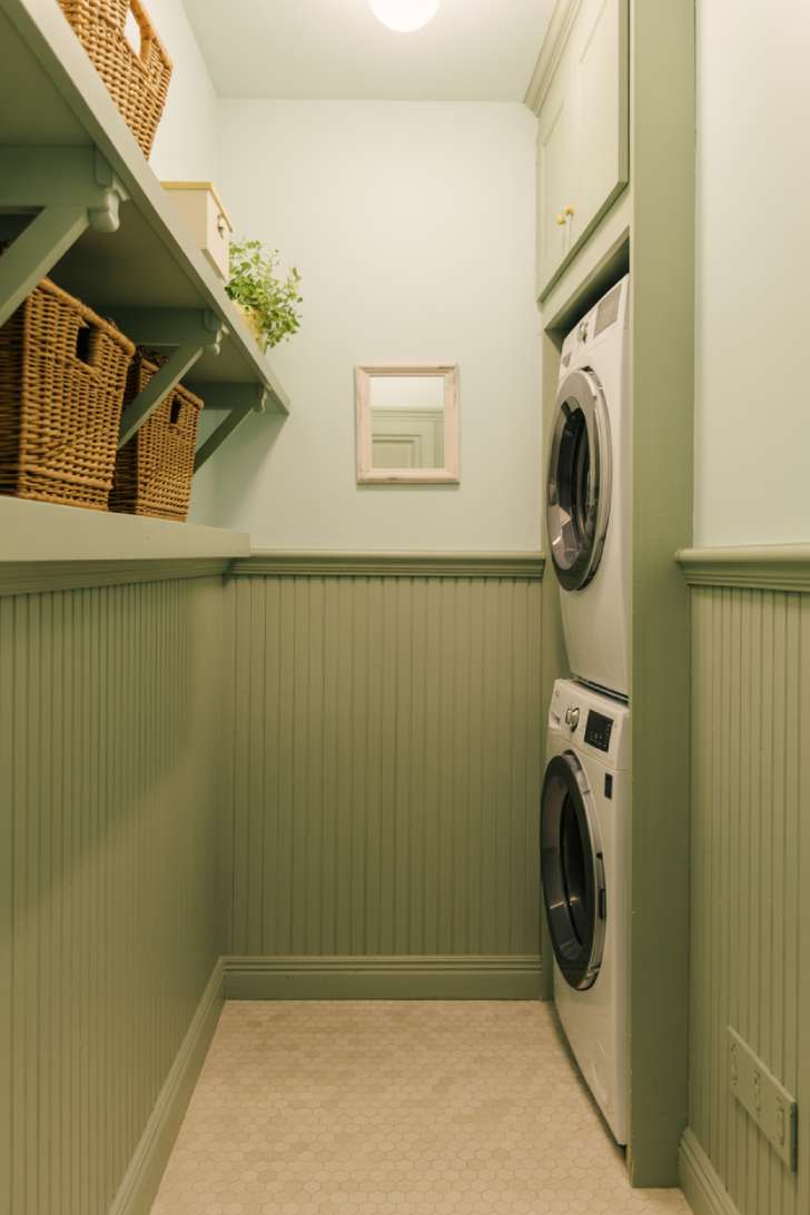 10 Gorgeous Sage Green Laundry Room Ideas for Your Home 4 Two-tone sage green and white laundry room with beadboard wainscoting
