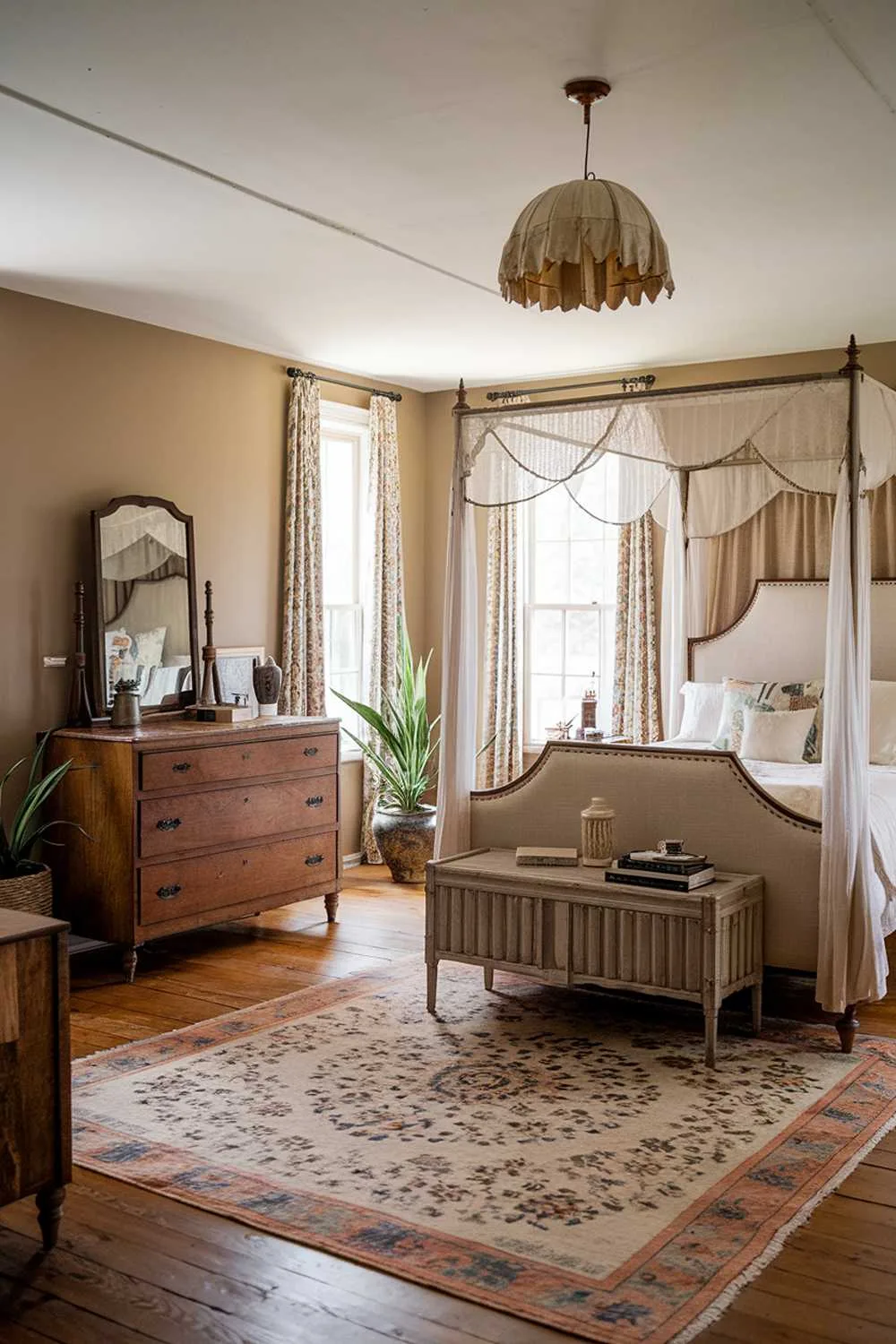 23 Vintage Farmhouse Bedroom Ideas for Cozy Charm 19 Romantic bedroom with white canopy, vintage dresser, and floral elements adding feminine touches